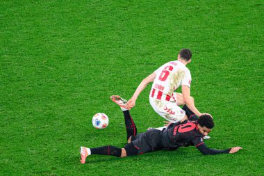 LEVERKUSEN, GERMANY - 13 ARALIK 2025: Eric Martel, Malik Tillman - Bundesliga maçı Bayer 04 Leverkusen 1.FC Koeln 'e karşı Bayena' da.