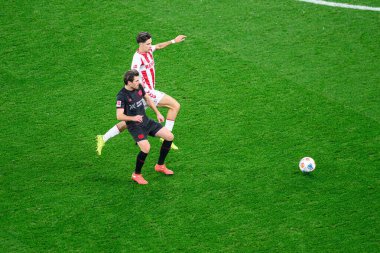 LEVERKUSEN, GERMANY - 13 ARALIK, 2025: Jonas Hofmann, Denis Huseinbasic - Bundesliga maçı Bayer 04 Leverkusen 'e karşı 1.FC Koeln.