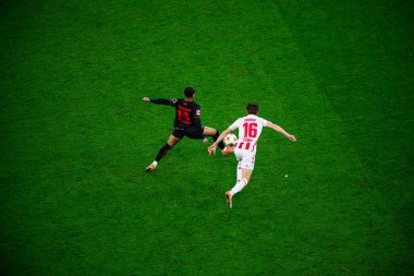 LEVERKUSEN, GERMANY - 13 Aralık 2025: Said El Mala, Axel Tape-Kobrissa - Bundesliga maçı Bayer 04 Leverkusen 'e karşı Bayarena' da 1.FC Koeln.