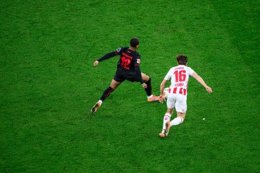 LEVERKUSEN, GERMANY - 13 Aralık 2025: Said El Mala, Axel Tape-Kobrissa - Bundesliga maçı Bayer 04 Leverkusen 'e karşı Bayarena' da 1.FC Koeln.