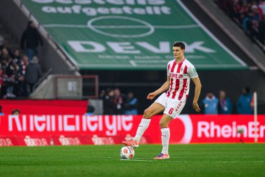 COLOGNE, Almanya - 20 ARALIK, 2025 Eric Martel - 1. Bundesliga maçı 1.FC Koeln 1 'e karşı. FC Union Berlin, Rhein Enerji Stadyumu.