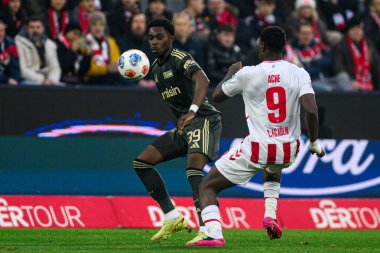 COLOGNE, Almanya - 20 ARALIK 2025 Ragnar Ache, Derrick Koehn - 1. Bundesliga maçı 1.FC Koeln 1 'e karşı. FC Union Berlin, Rhein Enerji Stadyumu.