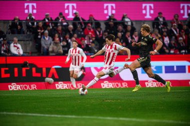 COLOGNE, Almanya - 20 ARALIK, 2025: Jakub Kaminski - 1. Bundesliga maçı 1.FC Koeln 1 'e karşı. FC Union Berlin, Rhein Enerji Stadyumu.