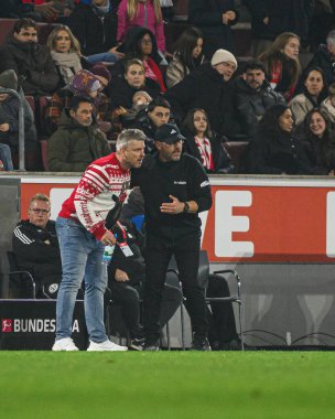 COLOGNE, Almanya - 20 ARALIK, 2025: Lukas Kwasniok, Steffen Baumgart - 1. Bundesliga maçı 1.FC Koeln 1 'e karşı. FC Union Berlin, Rhein Enerji Stadyumu.