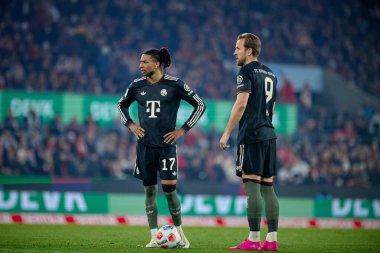 COLOGNE, Almanya - 14 Ocak 2026: Michael Olise, Harry Kane, 1.Bundesliga futbol maçı 1. FC Koeln, FC Bayern Münih 'e karşı. Rhein Enerji Stadyumunda