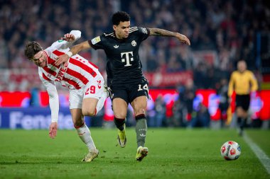 COLOGNE, Almanya - 14 Ocak 2026: Jan Thielmann, Luis Diaz, 1.Bundesliga 1. FC Koeln, FC Bayern Münih 'e karşı. Rhein Enerji Stadyumunda