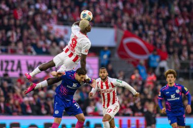 COLOGNE, GERMANY - 17 Ocak 2026: Ragnar Ache, Dominik Kohr, 1. FC Koeln 1 'e karşı. Rhein Enerji Stadyumunda FSV Mainz 05