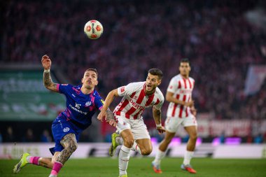 COLOGNE, ALMANY - 17 Ocak 2026: Tom Krauss, PHILLIP TIETZ, 1.Bundesliga futbol maçı 1. FC Koeln 1 'e karşı. Rhein Enerji Stadyumunda FSV Mainz 05