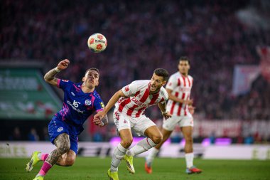 COLOGNE, ALMANY - 17 Ocak 2026: Tom Krauss, PHILLIP TIETZ, 1.Bundesliga futbol maçı 1. FC Koeln 1 'e karşı. Rhein Enerji Stadyumunda FSV Mainz 05