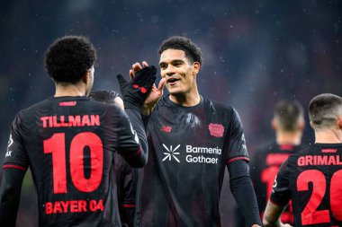 LEVERKUSEN, GERMANY - 28 JANUARY, 2026: Jarell Quansah, Malik Tillman - Bayer 04 Leverkusen ile Villareal FC arasındaki UEFA Şampiyonlar Ligi maçı.