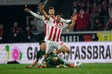 COLOGNE, Almanya - 30 HAZİRAN, 2026: Cenk Özkacar - 1. Bundesliga futbol maçı 1. FC Koeln, VfL Wolfsburg 'a karşı. Rhein Enerji Stadyumunda.