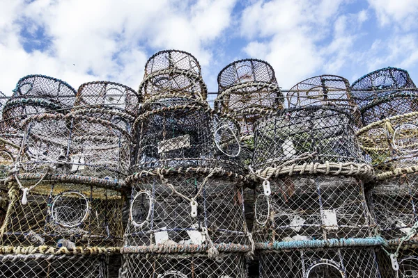 Stack of lobster pots at harbour side — Stock Photo, Image