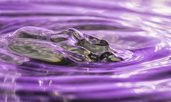 The wave after a water drop Stock Photo