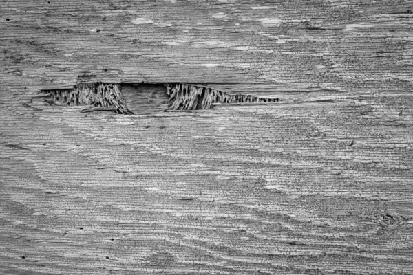 Yıpranmış ahşap desenli, pürüzlü kenar ve tahıllı, tasarım için çatlak yüzeyi olan arka plan.