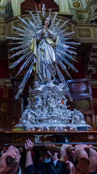 Cospicua, Malta - November 28th, 2025, Statue of Virgin Mary With Radiant Halo Inside Ornate Church During Traditional Procession Ceremony