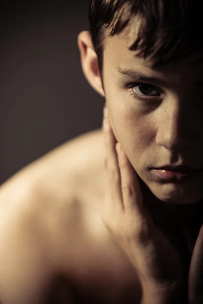 Shirtless Teenage Boy Glaring with Hands on Neck — 스톡 사진