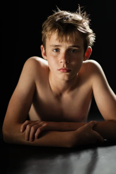 Young Shirtless Teen Boy Lying on Stomach on Floor — Stock Photo, Image