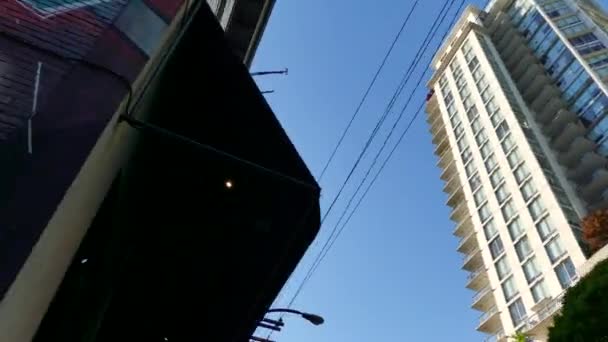 Car moving downtown Vancouver blue sky — Stock Video