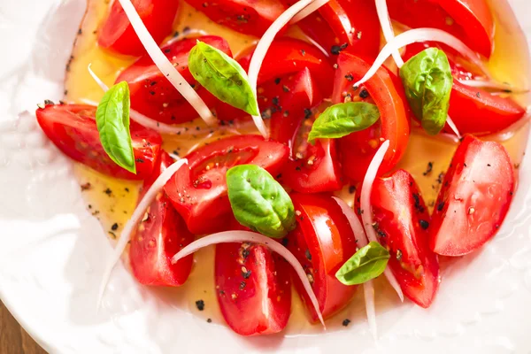 The combination of olive oil to cut tomatoes — Stock Photo, Image