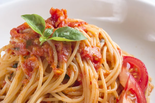 Tomatoes plenty of pasta Stock Image