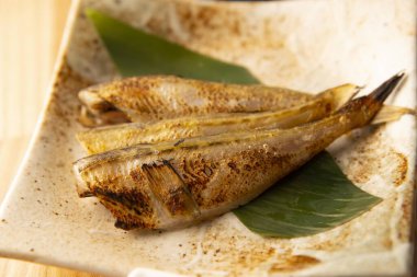 Delicious fish grilled over charcoal on a shichirin