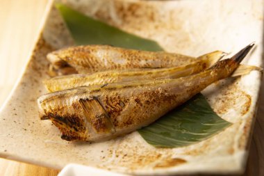 Delicious fish grilled over charcoal on a shichirin