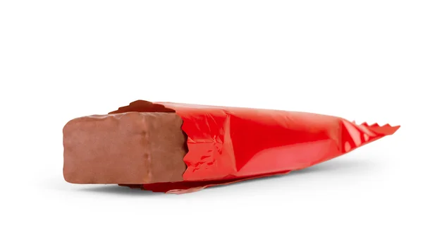 Chocolate bar wrapped in red on a white background — Stock Photo, Image