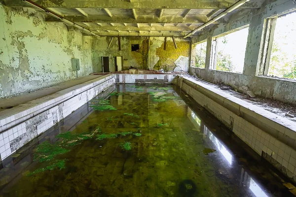 Abandoned school swimming pool in ghost town Pripyat Chornobyl Zone, radiation, nuclear catastrofe