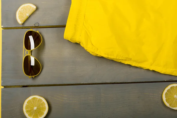 Man beach accessories on wooden background — Stock Photo, Image