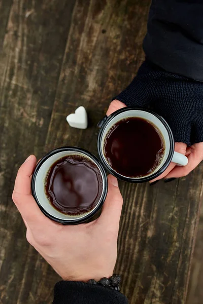 Two Cups Tea Nature Hands Couple Black Gloves Wooden Background — Stock Photo, Image