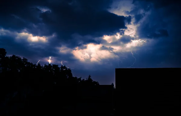 Lightning storm in purple light — Stock Photo, Image