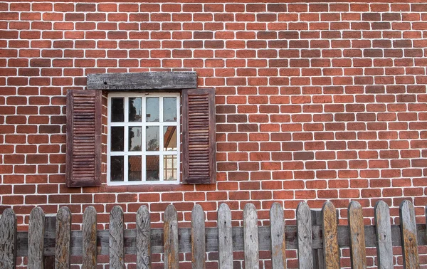 brick building, wood windows in brick building.