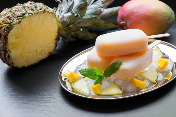 Pineapple mango sorbet ice cream popsicles. — Stock Photo, Image