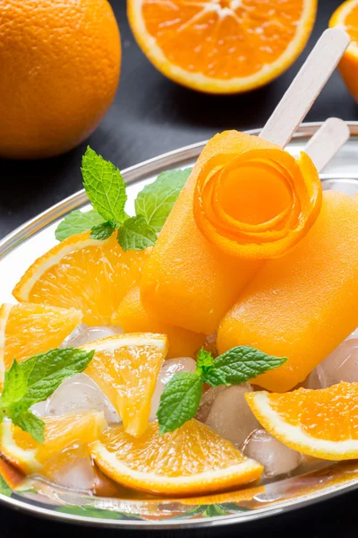 Orange fruit sorbet ice cream popsicles. — Stock Photo, Image