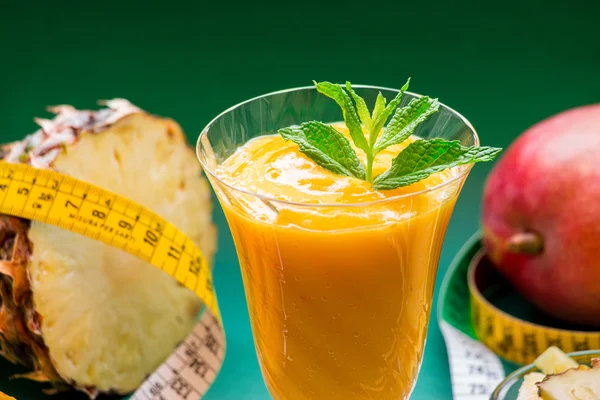 Pineapple mango smoothie, ingredients and centimeter. — Stock Photo, Image