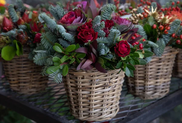 Beautiful Flower Arrangement Red Roses Natural Spruce Branches Brassica Oleracea — Zdjęcie stockowe