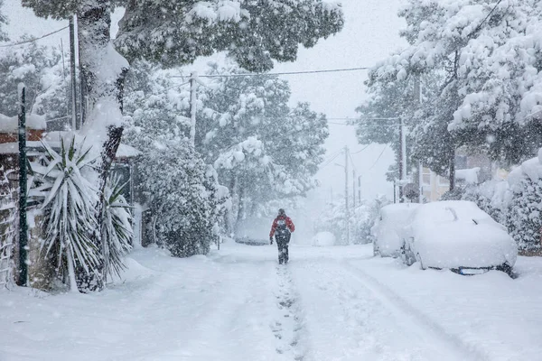 Beautiful winter morning snow covered streets of Athens, Greece, 16th of February 2021.