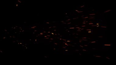 Sıcak parlayan köz. Işıltılı parçacıklar