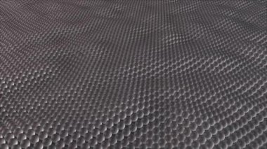 İstiflenmiş kürelerden dalgalar ve tepeler.