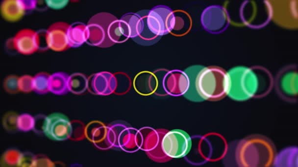 Rijen van multi gekleurde cirkels en ringen — Stockvideo