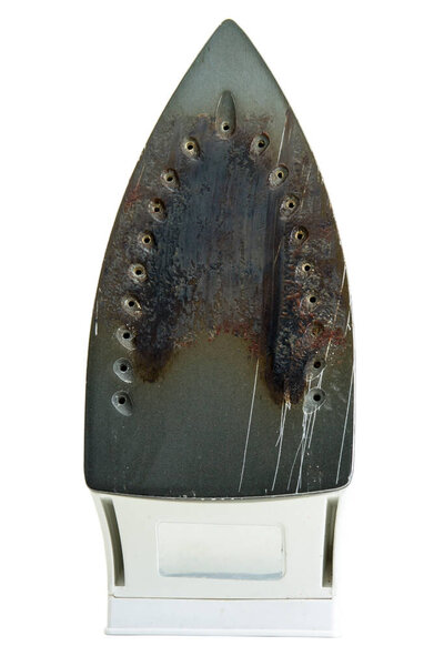Degraded steam iron isolated on white background with clipping path
