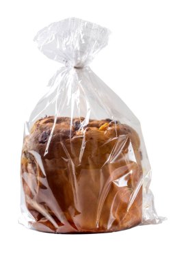 Panettone plastik torba içinde beyaz arkaplan üzerinde izole edilmiş kırpma yolu dahil