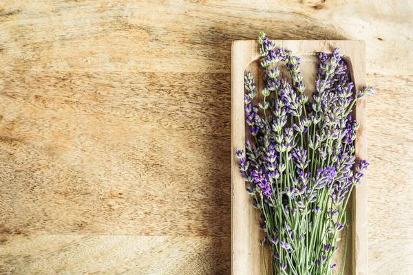 Fresh lavender bouquet on wooden background, copy space — Stock Photo, Image