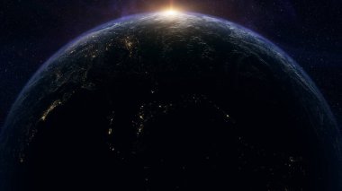 Dünya, uzayda gün doğumuyla aydınlandı.