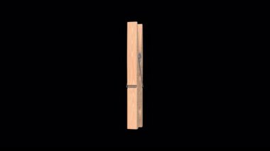 Çamaşır mandalı şeffaf bir arkaplanda dönüyor. Kusursuz döngü. Kıyafet mandalları. 4K