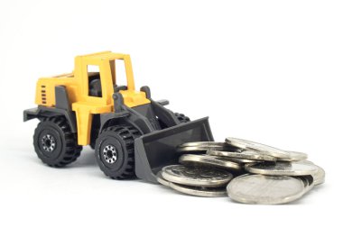 Sarı Oyuncak Yükleyici Endonezya Bozukluklarını Beyaz Arkaplanda Basıyor, İnşaat Bütçesi Kavramı, Ağır Endüstri Yatırımı ve Mali Büyüme