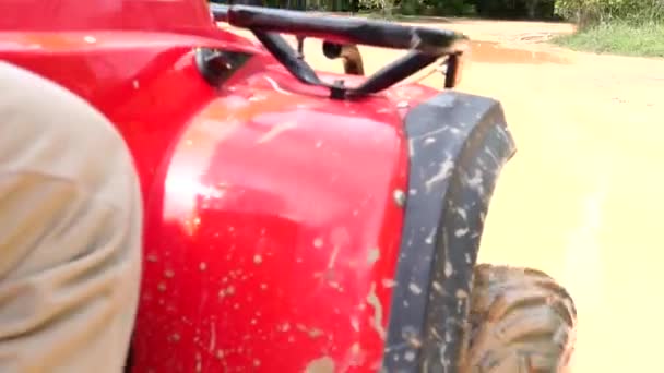 ATV drive through mud puddle — Stock Video