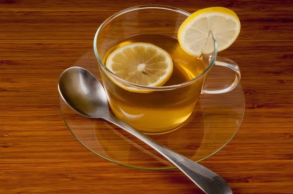 Black tea with lemon — Stock Photo, Image