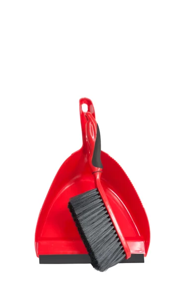 Poêle à poussière rouge avec brosse dessus — Photo