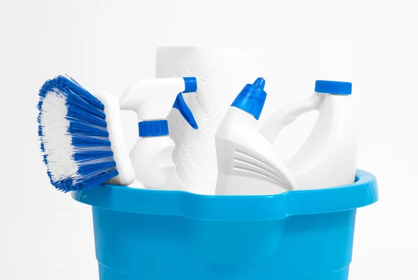 Cleaning supplies in blue bucket — Stock Photo, Image